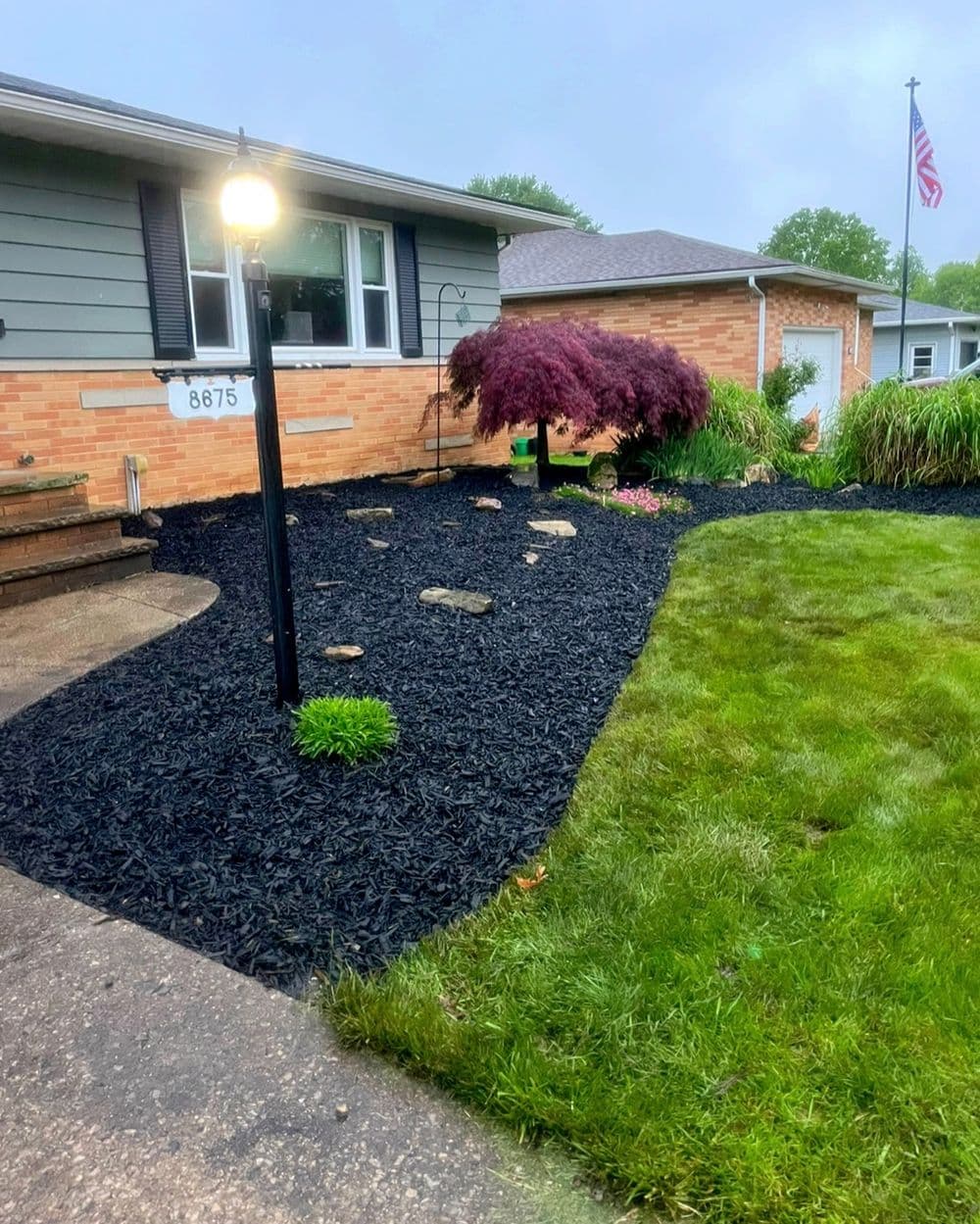 Gravel to Double Shredded Black Mulch Transformation image